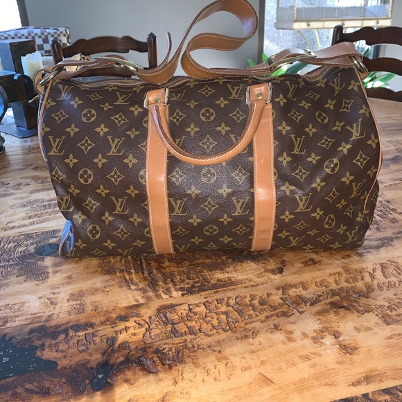 Louis Vuitton duffle bag with exterior pockets - Picture 6 of 16